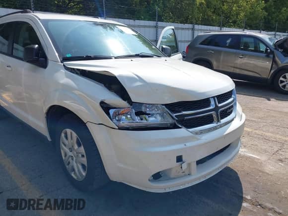 2016 Dodge Journey SE with VIN 3C4PDCAB2GT103518, listed as a IAAI auction lot 43172662 with 149,798 mi miles and . Bid and sale history available at DreamBid. Image 6.
