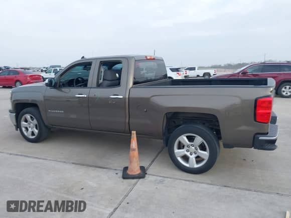 2015 Chevrolet Silverado 1500 LS with VIN 1GCRCPEH7FZ317736, listed as a IAAI auction lot 41788598 with 153,629 mi miles and . Bid and sale history available at DreamBid. Image 14.
