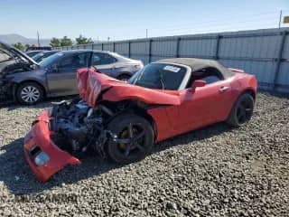 2008 Saturn Sky Red Line with VIN 1G8MG35X68Y120137, listed as a Copart auction lot 61247555 with 107,394 mi miles and Salvage title. Bid and sale history available at DreamBid. Image 1.