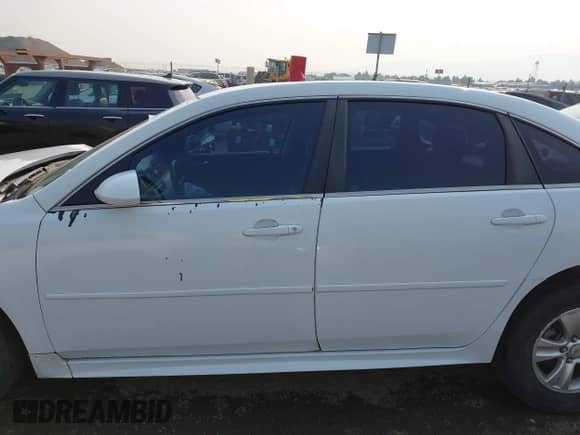 2013 Chevrolet Impala LS with VIN 2G1WF5E35D1240348, listed as a IAAI auction lot 43131336 with 137,558 mi miles and . Bid and sale history available at DreamBid. Image 14.