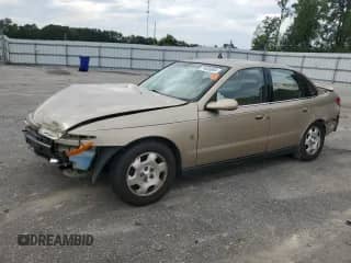 2001 Saturn LS with VIN 1G8JW54R11Y557232, listed as a Copart auction lot 74638904 with 158,729 mi miles and Salvage title. Bid and sale history available at DreamBid. Image 1.