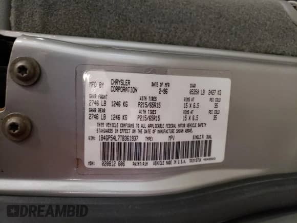 1996 Dodge Caravan LE with VIN 1B4GP54L7TB361937, listed as a Copart auction lot 71636564 with 186,812 mi miles and Salvage title. Bid and sale history available at DreamBid. Image 15.