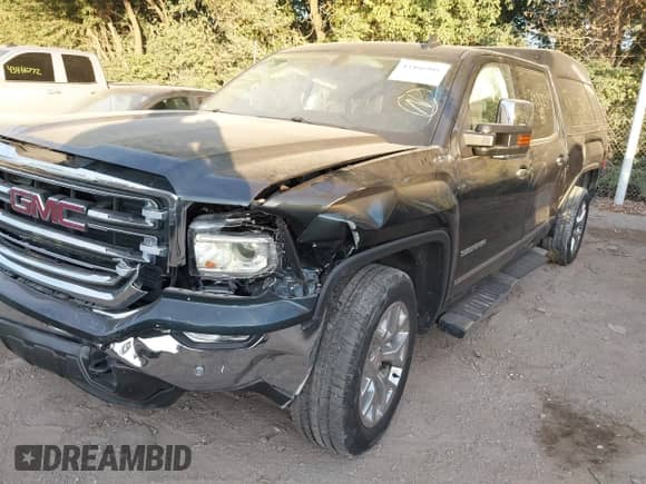 2017 GMC Sierra 1500 SLT z VIN 3GTU2NEJXHG390025, wystawiony jako IAAI lot #43466901 z przebiegiem 66 494 mil mil oraz . Historia ofert i sprzedaży dostępna na DreamBid. Obrazek 6.