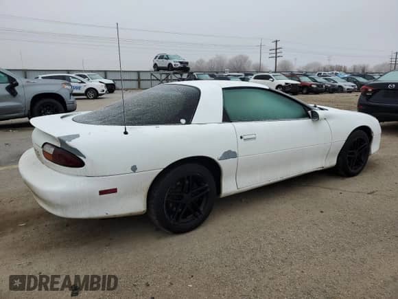 2001 Chevrolet Camaro с VIN 2G1FP22K112134380, выставлен на аукционе Copart как лот 83775664 с пробегом 277 418 миль миль и Списание • Salvage title. История ставок и продаж доступна на DreamBid. Изображение 3.