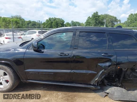 2017 Jeep Grand Cherokee Altitude with VIN 1C4RJFAG3HC889518, listed as a IAAI auction lot 42658201 with 112,264 mi miles and . Bid and sale history available at DreamBid. Image 14.