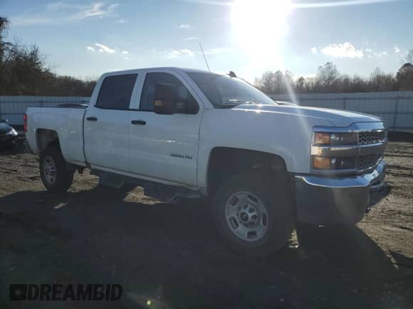 2019 Chevrolet Silverado 2500HD Work Truck z VIN 1GC1KREG7KF124470, wystawiony jako Copart lot #82181094 z przebiegiem 128 984 mil mil oraz Szkoda całkowita • Salvage title. Historia ofert i sprzedaży dostępna na DreamBid. Obrazek 4.