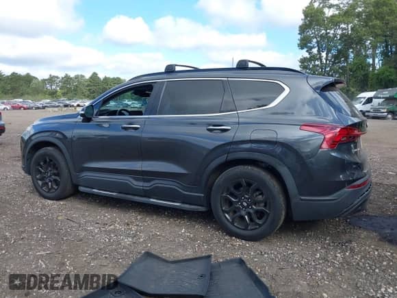 2022 Hyundai Santa Fe XRT with VIN 5NMS64AJ8NH428704, listed as a IAAI auction lot 43082726 with 50,307 mi miles and . Bid and sale history available at DreamBid. Image 14.
