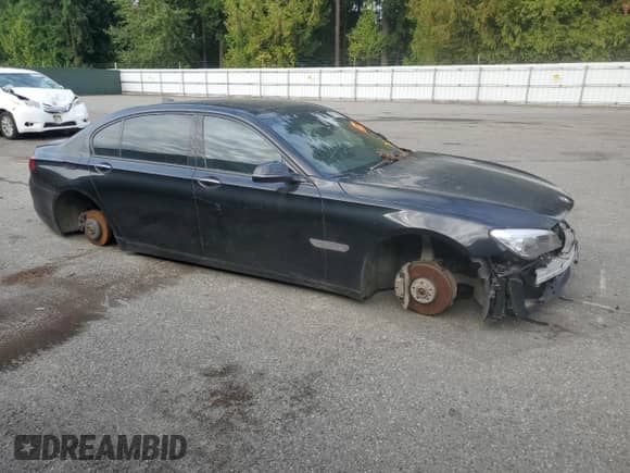 2015 BMW 7 Series 740Li with VIN WBAYE4C52FD947011, listed as a Copart auction lot 69152415 with Not provided miles and Salvage title. Bid and sale history available at DreamBid. Image 4.