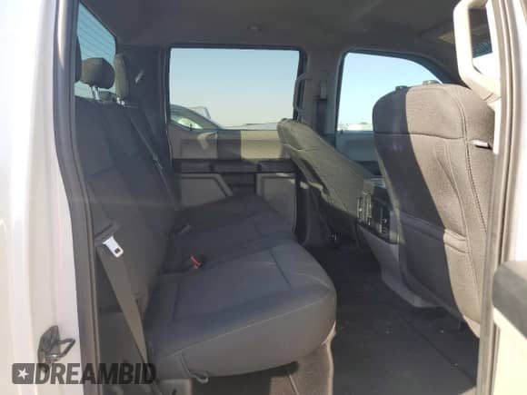 2020 Ford F-150 XL with VIN 1FTEW1CPXLFA15710, listed as a Copart auction lot 61944055 with 98,561 mi miles and Salvage title. Bid and sale history available at DreamBid. Image 10.