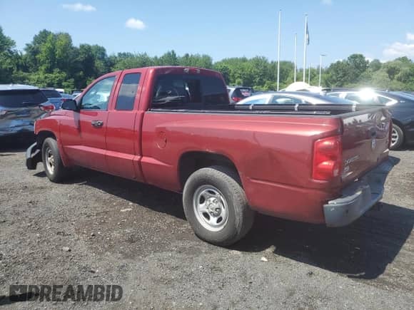 2006 Dodge Dakota z VIN 1D7HW22N26S704144, wystawiony jako Copart lot #64474675 z przebiegiem 91 585 mil mil oraz Szkoda całkowita • Salvage title. Historia ofert i sprzedaży dostępna na DreamBid. Obrazek 2.