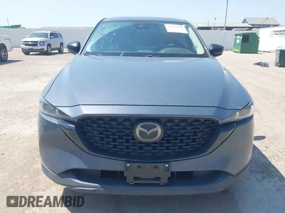 2022 Mazda CX-5 S Preferred with VIN JM3KFBCM9N0529494, listed as a IAAI auction lot 43179890 with 57,495 mi miles and . Bid and sale history available at DreamBid. Image 13.
