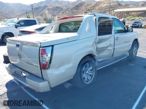 2002 Cadillac Escalade EXT with VIN 3GYEK63N32G288941, listed as a IAAI auction lot 43235158 with 295,475 mi miles and . Bid and sale history available at DreamBid. Image 4.