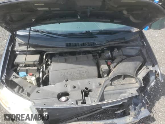 2013 Honda Odyssey EX-L with VIN 5FNRL5H65DB029618, listed as a Copart auction lot 70712485 with 195,097 mi miles and Salvage title. Bid and sale history available at DreamBid. Image 12.