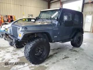 2001 Jeep Wrangler SE with VIN 1J4FA29P11P358326, listed as a Copart auction lot 56181715 with 201,929 mi miles and Clean title. Bid and sale history available at DreamBid. Image 1.