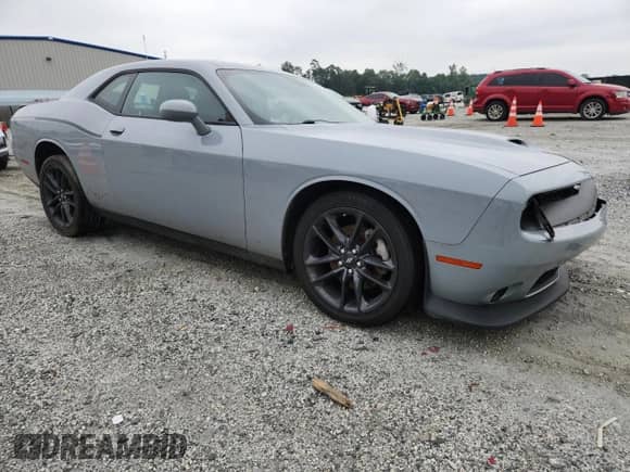 2022 Dodge Challenger GT with VIN 2C3CDZKG3NH231014, listed as a Copart auction lot 69206665 with 68,994 mi miles and Salvage title. Bid and sale history available at DreamBid. Image 4.