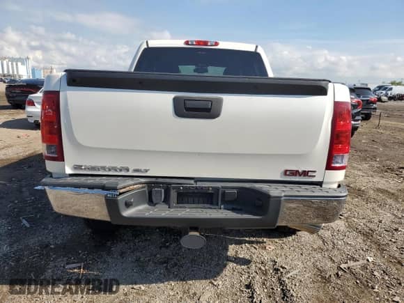 2013 GMC Sierra 1500 SLT с VIN 3GTP2WE7XDG210317, выставлен на аукционе Copart как лот 70132025 с пробегом 128 727 миль миль и Списание • Salvage title. История ставок и продаж доступна на DreamBid. Изображение 6.