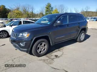 2014 Jeep Grand Cherokee Laredo z VIN 1C4RJFAG5EC242680, wystawiony jako Copart lot #86693945 z przebiegiem 145 212 mil mil oraz Szkoda całkowita • Salvage title. Historia ofert i sprzedaży dostępna na DreamBid. Obrazek 1.