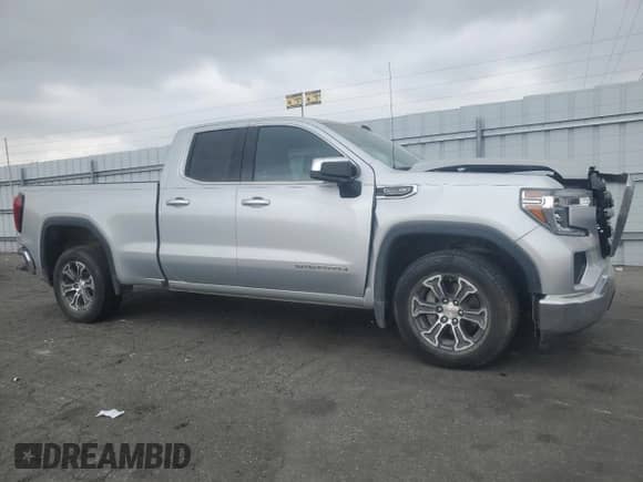 2022 GMC Sierra 1500 SLE with VIN 1GTR8BED3NZ151246, listed as a Copart auction lot 56206184 with 61,718 mi miles and Salvage title. Bid and sale history available at DreamBid. Image 4.