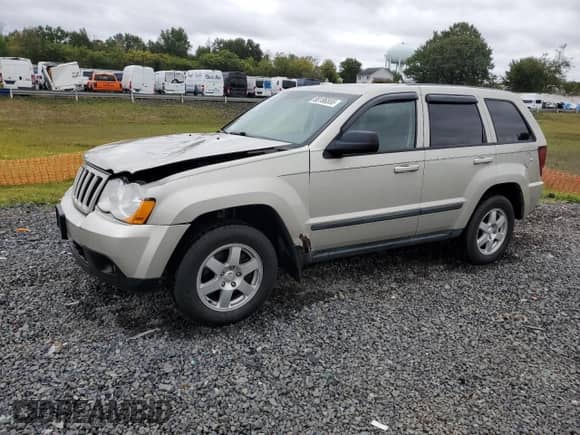 2008 Jeep Grand Cherokee Laredo with VIN 1J8GR48K28C131516, listed as a Copart auction lot 80186555 with 197,998 mi miles and Salvage title. Bid and sale history available at DreamBid. Image 1.