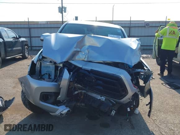 2022 Toyota Tacoma SR5 with VIN 3TMAZ5CN3NM194543, listed as a IAAI auction lot 43031222 with 21,800 mi miles and . Bid and sale history available at DreamBid. Image 12.