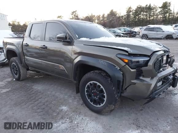 2024 Toyota Tacoma SR5 with VIN 3TMLB5JN9RM046175, listed as a IAAI auction lot 41006597 with 6,139 mi miles and . Bid and sale history available at DreamBid. Image 1.
