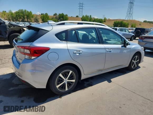 2023 Subaru Impreza Premium with VIN 4S3GTAD66P3720342, listed as a Copart auction lot 69833715 with 14,139 mi miles and Salvage title. Bid and sale history available at DreamBid. Image 3.