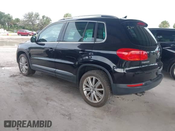 2015 Volkswagen Tiguan S with VIN WVGAV7AX5FW591728, listed as a IAAI auction lot 43205069 with 81,126 mi miles and . Bid and sale history available at DreamBid. Image 3.