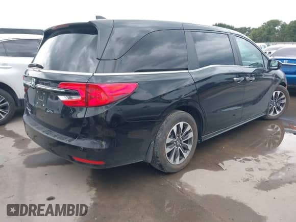 2021 Honda Odyssey EX-L with VIN 5FNRL6H77MB038996, listed as a IAAI auction lot 42647748 with 22,535 mi miles and . Bid and sale history available at DreamBid. Image 4.