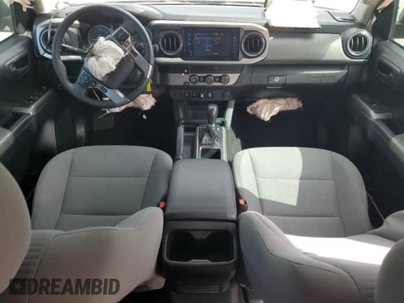 2019 Toyota Tacoma SR5 с VIN 5TFAZ5CN1KX086783, выставлен на аукционе Copart как лот 70166865 с пробегом 62 838 миль миль и Списание • Salvage title. История ставок и продаж доступна на DreamBid. Изображение 8.