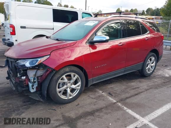 2021 Chevrolet Equinox Premier z VIN 2GNAXNEV1M6103272, wystawiony jako IAAI lot #43397887 z przebiegiem 80 967 mil mil oraz . Historia ofert i sprzedaży dostępna na DreamBid. Obrazek 17.