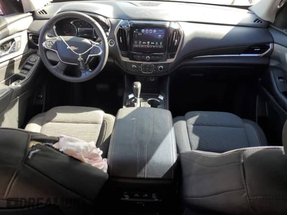 2018 Chevrolet Traverse LT Cloth z VIN 1GNERGKW6JJ281018, wystawiony jako Copart lot #55261455 z przebiegiem 111 630 mil mil oraz Nie do naprawy • Non repairable. Historia ofert i sprzedaży dostępna na DreamBid. Obrazek 8.