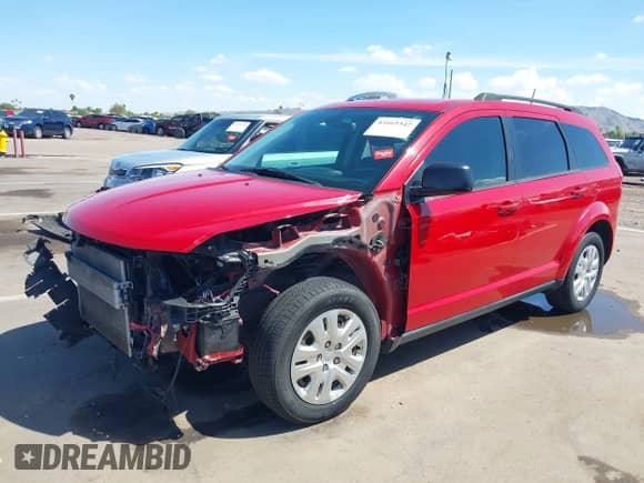 2020 Dodge Journey SE Value with VIN 3C4PDCAB0LT199658, listed as a IAAI auction lot 43165342 with 110,376 mi miles and . Bid and sale history available at DreamBid. Image 2.
