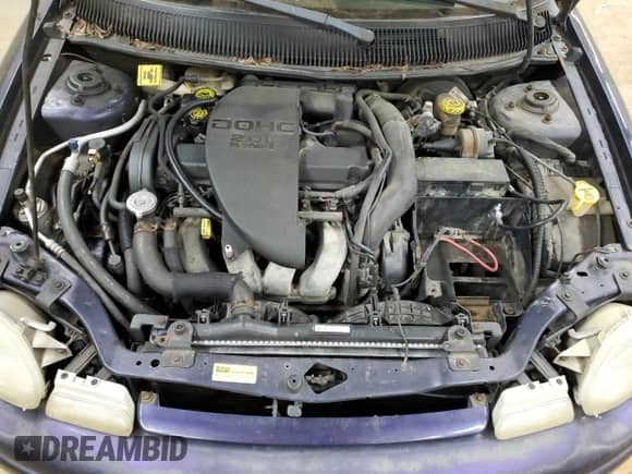1998 Dodge Neon with VIN 1B3ES42Y8WD642673, listed as a Copart auction lot 85553634 with 146,232 mi miles and Salvage title. Bid and sale history available at DreamBid. Image 13.