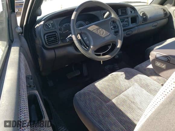 1999 Dodge 2500 with VIN 3B7KF26Z4XM515499, listed as a Copart auction lot 74273914 with 99,380 mi miles and Clean title. Bid and sale history available at DreamBid. Image 8.