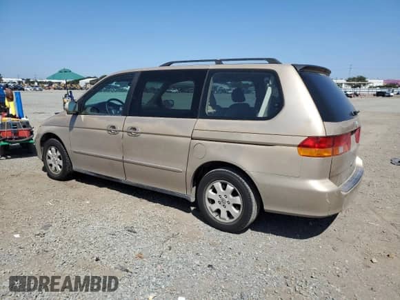 2002 Honda Odyssey EX z VIN 2HKRL18682H549304, wystawiony jako Copart lot #71229805 z przebiegiem 192 150 mil mil oraz Szkoda całkowita • Salvage title. Historia ofert i sprzedaży dostępna na DreamBid. Obrazek 2.