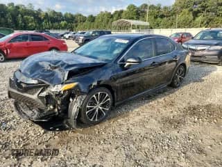 2019 Toyota Camry LE с VIN 4T1B11HK9KU788690, выставлен на аукционе Copart как лот 72049215 с пробегом 125 723 миль миль и Списание • Salvage title. История ставок и продаж доступна на DreamBid. Изображение 1.