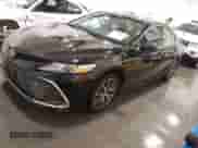 2023 Toyota Camry Hybrid XLE z VIN 4T1F31AK5PU611888, wystawiony jako IAAI lot #41304654 z przebiegiem 40 140 mil mil oraz . Historia ofert i sprzedaży dostępna na DreamBid. Obrazek 17.