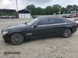 2011 BMW 7 Series 740Li with VIN WBAKB4C57BC574689, listed as a Copart auction lot 54701195 with 135,878 mi miles and Clean title. Bid and sale history available at DreamBid. Image 1.