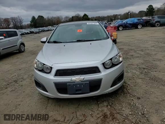 2012 Chevrolet Sonic LS with VIN 1G1JB5SHXC4152839, listed as a Copart auction lot 84397384 with 132,162 mi miles and Salvage title. Bid and sale history available at DreamBid. Image 11.