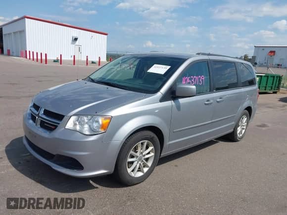 2013 Dodge Grand Caravan SXT with VIN 2C4RDGCG1DR602334, listed as a IAAI auction lot 42537139 with 214,688 mi miles and . Bid and sale history available at DreamBid. Image 2.