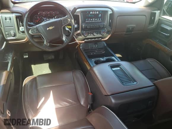 2017 Chevrolet Silverado 1500 High Country с VIN 3GCPCTECXHG316359, выставлен на аукционе Copart как лот 68711644 с пробегом 142 819 миль миль и Списание • Salvage title. История ставок и продаж доступна на DreamBid. Изображение 8.