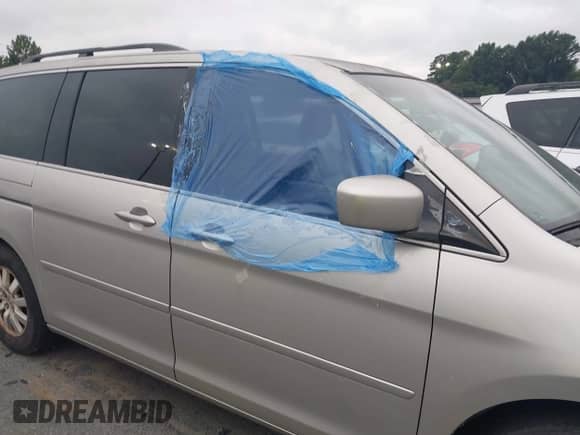 2008 Honda Odyssey EX-L with VIN 5FNRL38638B411964, listed as a IAAI auction lot 43328353 with 184,227 mi miles and . Bid and sale history available at DreamBid. Image 6.