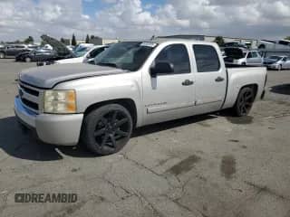 2007 Chevrolet Silverado 1500 1LT with VIN 2GCEC13J571631154, listed as a Copart auction lot 84930955 with 201,799 mi miles and Salvage title. Bid and sale history available at DreamBid. Image 1.