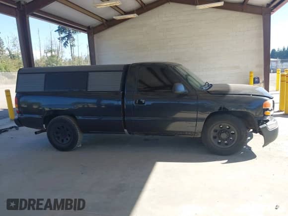2005 GMC Sierra 1500 Work Truck z VIN 1GTEC14X75Z329663, wystawiony jako IAAI lot #42872806 z przebiegiem 182 385 mil mil oraz . Historia ofert i sprzedaży dostępna na DreamBid. Obrazek 14.