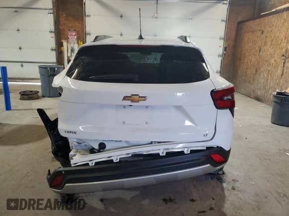 2024 Chevrolet Trax LT z VIN KL77LHE2XRC222293, wystawiony jako Copart lot #70397095 z przebiegiem Nie podano mil oraz Szkoda całkowita • Salvage title. Historia ofert i sprzedaży dostępna na DreamBid. Obrazek 6.