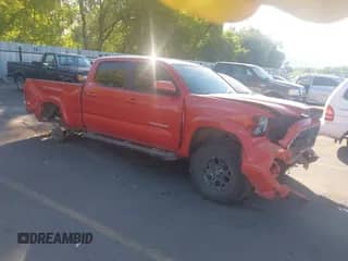 2018 Toyota Tacoma TRD Sport with VIN 3TMDZ5BN4JM052470, listed as a IAAI auction lot 43123162 with 51,319 mi miles and . Bid and sale history available at DreamBid. Image 1.