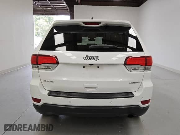 2020 Jeep Grand Cherokee Laredo E z VIN 1C4RJFAG4LC196482, wystawiony jako Copart lot #84601225 z przebiegiem 129 525 mil mil oraz Czysty tytuł • Clean title. Historia ofert i sprzedaży dostępna na DreamBid. Obrazek 6.