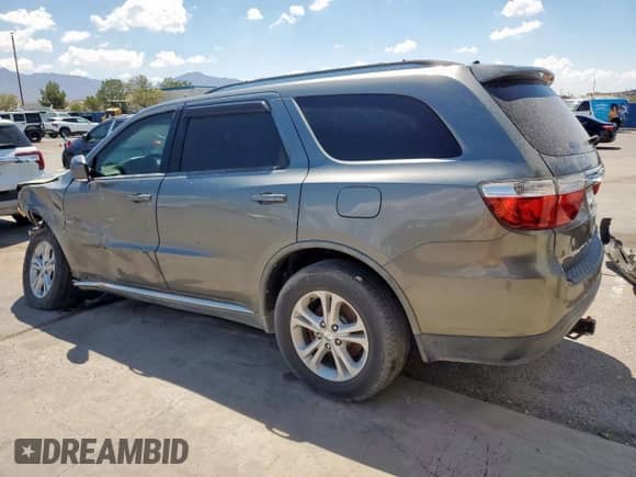 2011 Dodge Durango Crew z VIN 1D4RD4GG9BC740334, wystawiony jako Copart lot #69963135 z przebiegiem 163 267 mil mil oraz Szkoda całkowita • Salvage title. Historia ofert i sprzedaży dostępna na DreamBid. Obrazek 2.