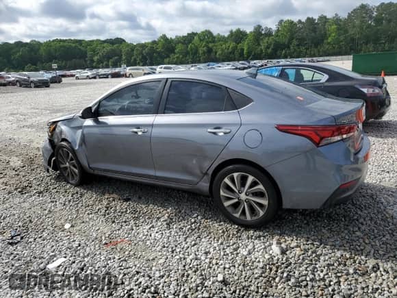 2018 Hyundai Accent Limited с VIN 3KPC34A38JE031087, выставлен на аукционе Copart как лот 56942635 с пробегом 129 692 миль миль и Списание • Salvage title. История ставок и продаж доступна на DreamBid. Изображение 2.