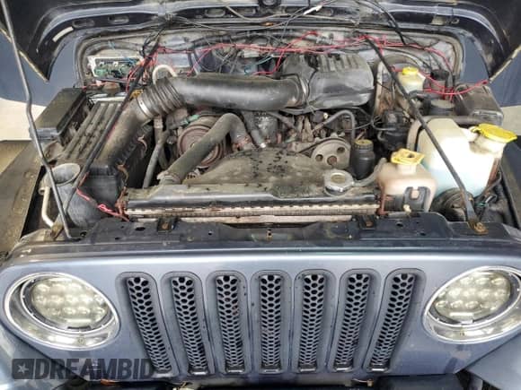 2001 Jeep Wrangler SE with VIN 1J4FA29P11P358326, listed as a Copart auction lot 56181715 with 201,929 mi miles and Clean title. Bid and sale history available at DreamBid. Image 12.